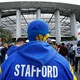 A Los Angeles Rams fan wearing a Matthew Stafford jersey