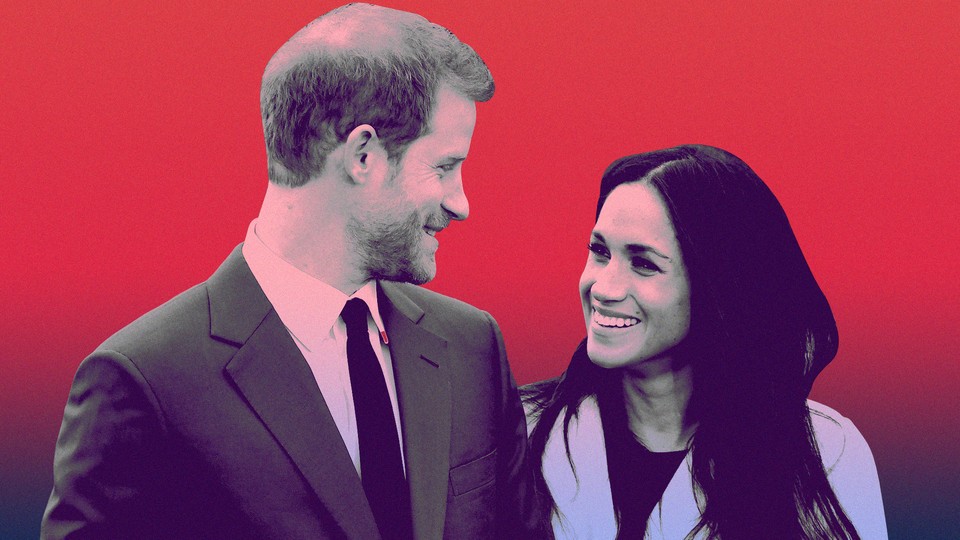 Prince Harry and Meghan Markle smiling at each other