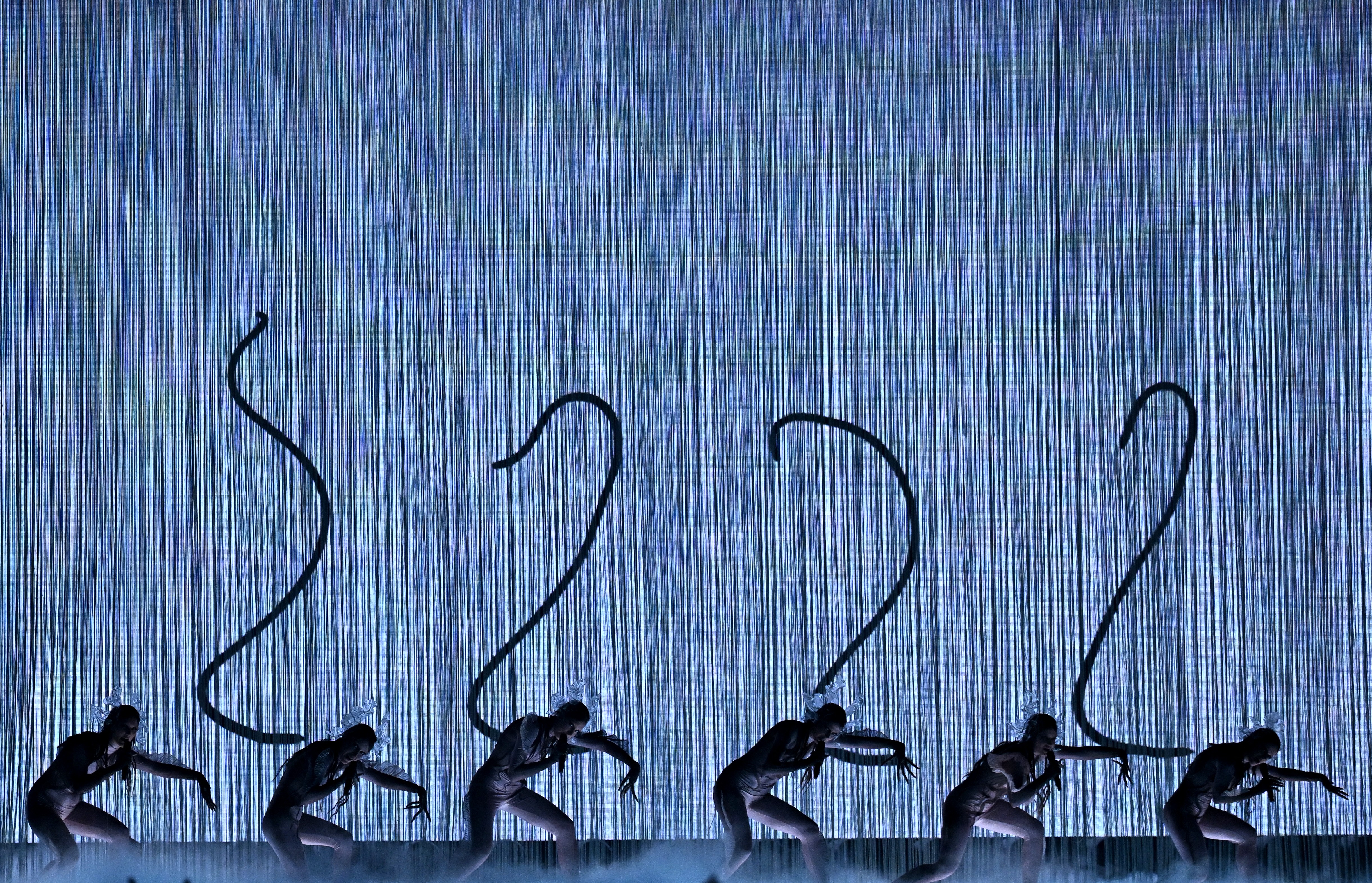 Six performers were placed in front of the video projection, making it look like it had a long tail.