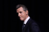 Gavin Newsom, looking pensive and worried.
