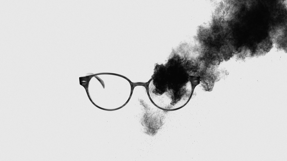 glasses obscured by black fog