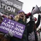 Protesters at the March for Life, with one holding an "I am the post-Roe generation" sign