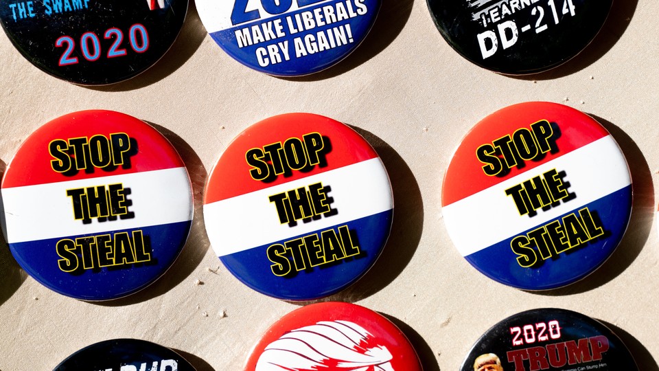 Buttons with "Stop the Steal" and "Make liberals cry again!" slogans