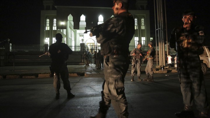 Security forces respond at the site of the attack on the al-Zahra mosque in Kabul, Afghanistan on June 15, 2017.
