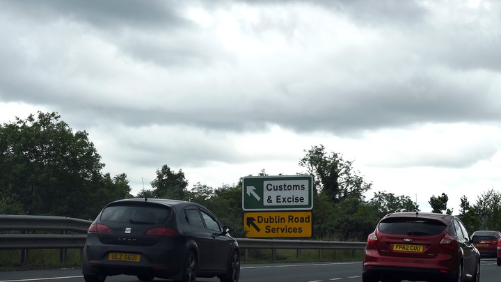 A sign for customs and excise is seen on the motorway approaching the border between Northern Ireland and Ireland on July 13, 2017.