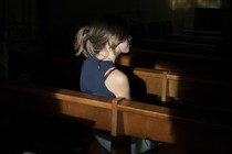 woman in church pew