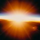 The sun shines brightly over the Earth's atmosphere