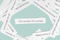 Scraps of paper with lines from the poem, with one that reads "This is my body. This is my body." in the center