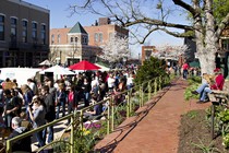 Neighbors gather at a farmers' market in Arkansas.