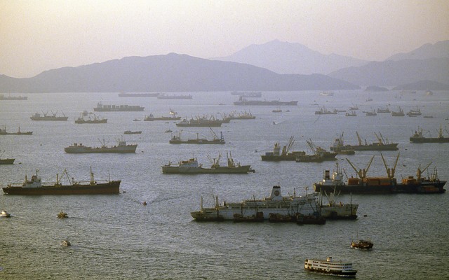 An aerial view of cargo ships in Hong Kong harbor.