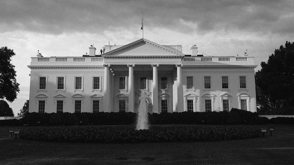 Black-and-white photograph of the White House