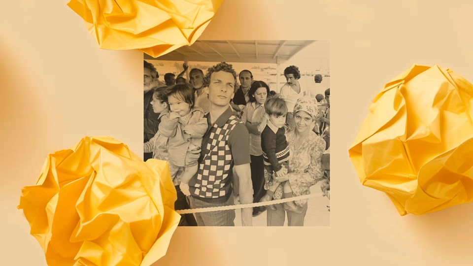 Members of a Cuban refugee family in late April 1980 wait to depart a boat that arrived in Florida from Havana