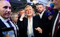 Far-right leader Marine Le Pen surrounded by people