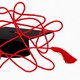 Illustration of a graduation cap with the tassel in a tangled knot