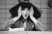 Photo of Gilda Radner as her SNL character Roseanne Roseannadanna