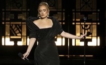 Adele in a black gown