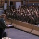 President Donald Trump speaks to U.S. troops.