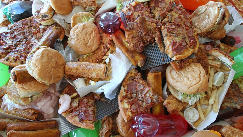 A large pile of unhealthy foods