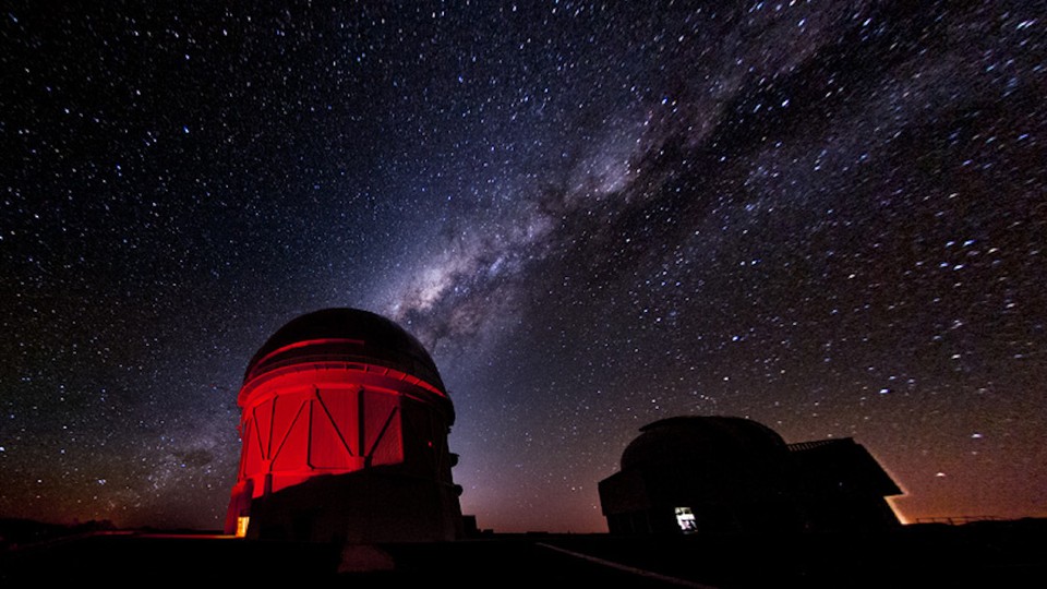 The Victor M. Blanco Telescope in Chile against a starry sky