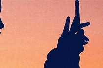 An image of a person on their phone