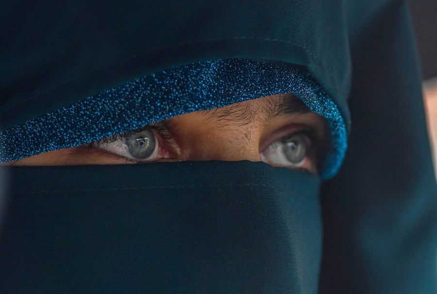 A close view of the eyes of a burqa-clad woman