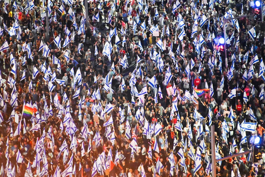 Thousands of protesters attend a demonstration in Tel Aviv