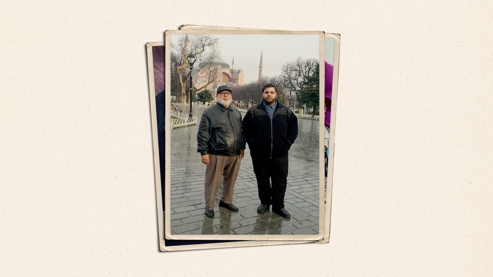 Picture of father and son in front of Mosque