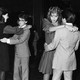 black-and-white photo of teenagers dancing