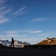 A man walks through Tasiilaq, Greenland.