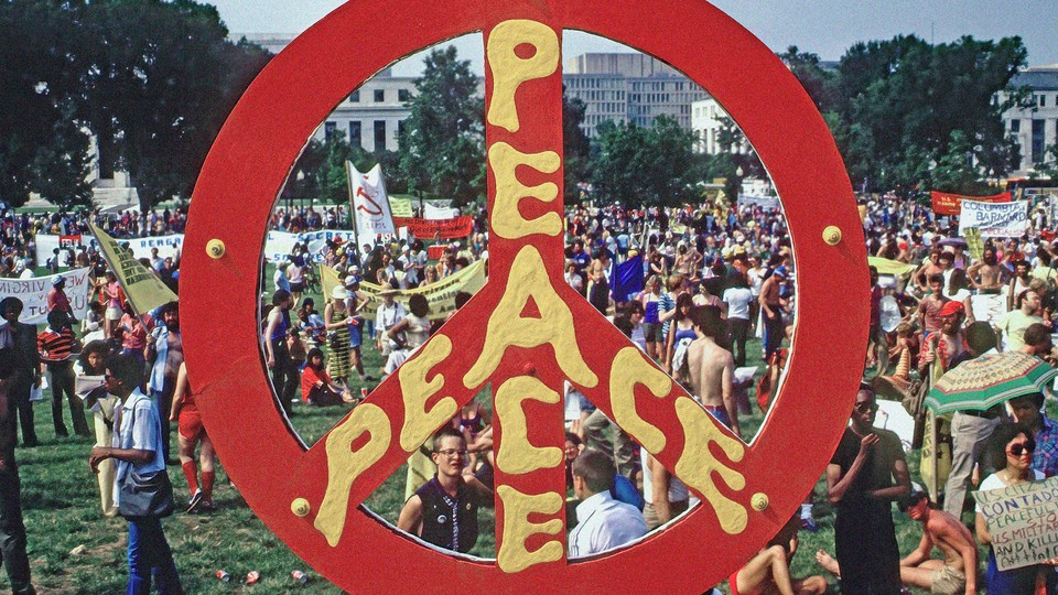 A peace sign in front of the White House