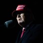 Donald Trump wearing a "Make America Great Again" hat