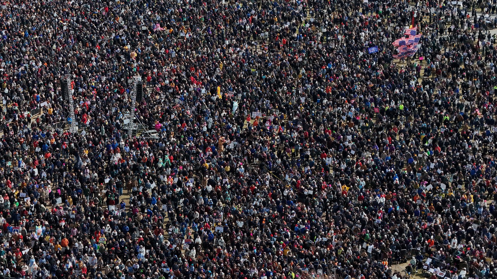 A drone view shows a large gathering of anti-Trump demonstrators in Boston.