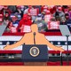 Illustration of Donald Trump's silhouette at a rally