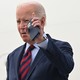 Joe Biden holding an iPhone