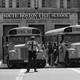 Students board buses. 