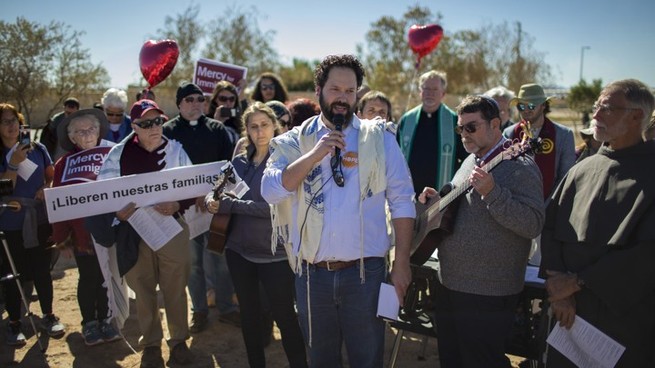 Rabbi Josh Whinston, a Reform Jewish leader from Ann Arbor, speaks during a rally outside a tent city in Texas