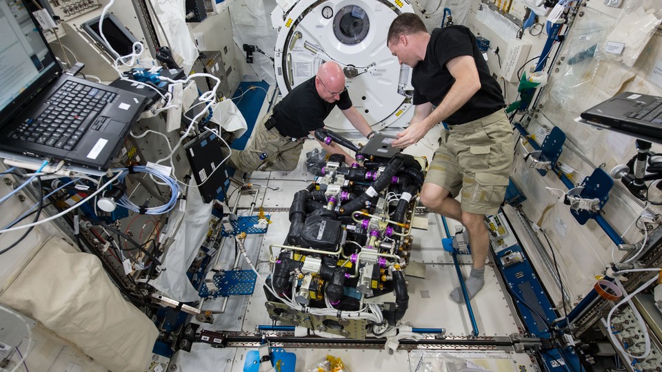 Astronauts work in the International Space Station.