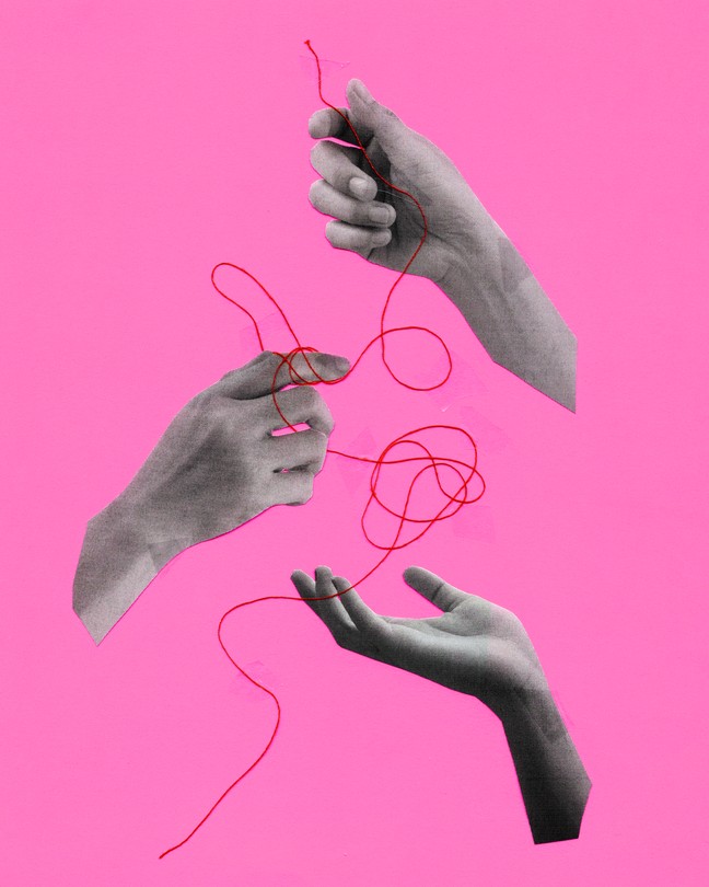 Three hands tangled in red string against a pink background