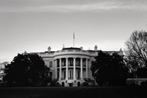 A black-and-white photo of the White House