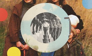 Vintage black and white photo of several people layered in concentric circles like a target, inside a circular color photo with blue sky, on top of background color family portrait in a field, with red, yellow, blue circles.