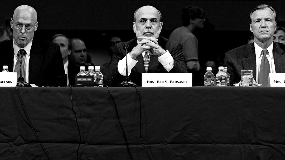 Henry Paulson, Ben Bernanke, and Christopher Cox sit before the Senate banking committee in September 2008