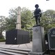A plywood partition surrounds a Confederate monument in Birmingham, Alabama's Linn Park.