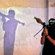 A masked member of Hamas holds a weapon in 2013.