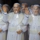 Plastic covered statues of Pope Francis stand for sale at a shop in Bogota, Colombia.