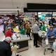 People grocery shopping in Spain to prepare for the coronavirus