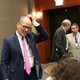 Democratic National Committee Chairman Tom Perez scratches his head.