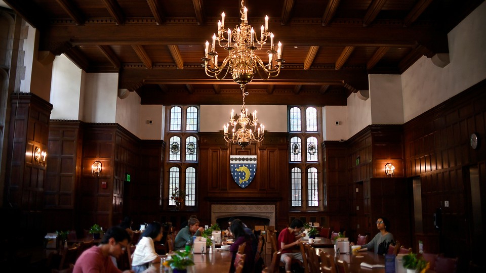 Dark-wood-panel dining hall at Yale University