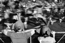 Onlookers cheer on runners at a 2017 Denver turkey trot.