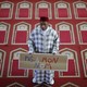 Khaloar Abdarahim holds a placard reading "Not in my name" as he poses inside the Arrahma Mosque in Nantes, France, in 2014.