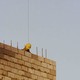 A construction worker atop a building in NYC